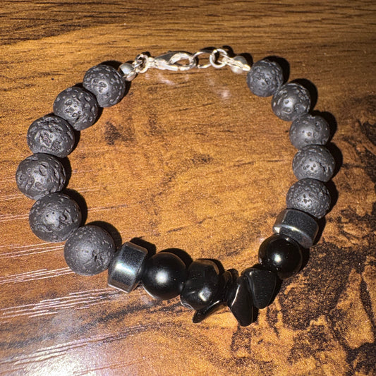 Black crystal beaded bracelet on a wooden surface