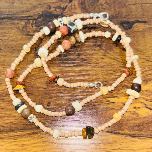 Beaded adornment on a wooden surface