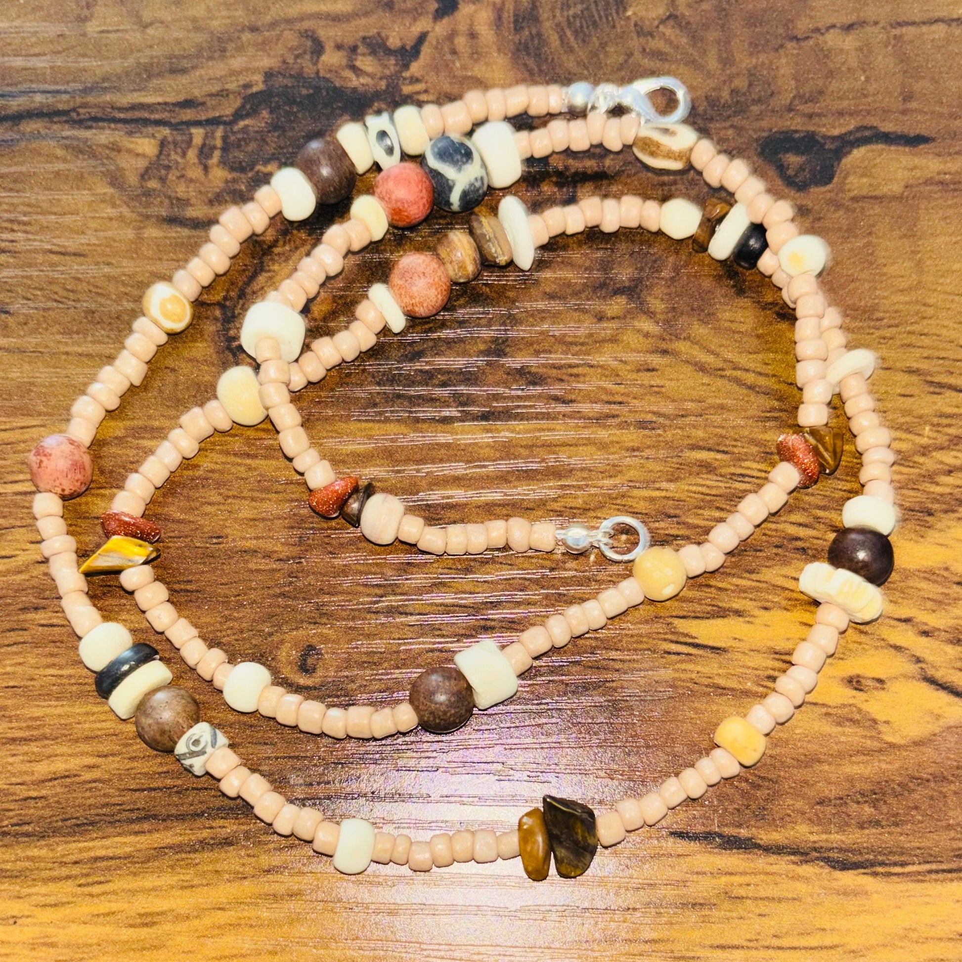 Beaded adornment on a wooden surface